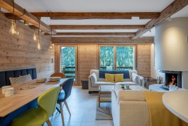 Fully renovated modern holiday apartment at Parc A15 in Champex-Lac by WADE Architecture.