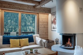 Fully renovated modern holiday apartment at Parc A15 in Champex-Lac by WADE Architecture.
