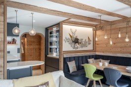 Fully renovated modern holiday apartment at Parc A15 in Champex-Lac by WADE Architecture.