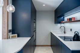 Fully renovated modern holiday apartment at Parc A15 in Champex-Lac by WADE Architecture.