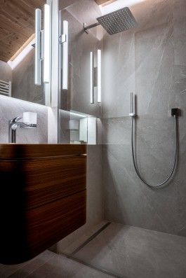 Fully renovated modern holiday apartment at Parc A15 in Champex-Lac by WADE Architecture.