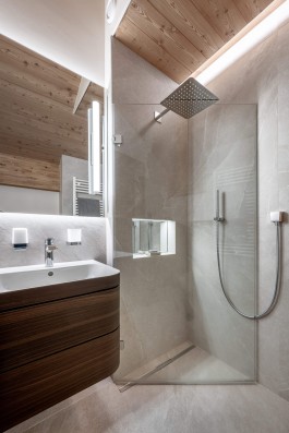 Fully renovated modern holiday apartment at Parc A15 in Champex-Lac by WADE Architecture.